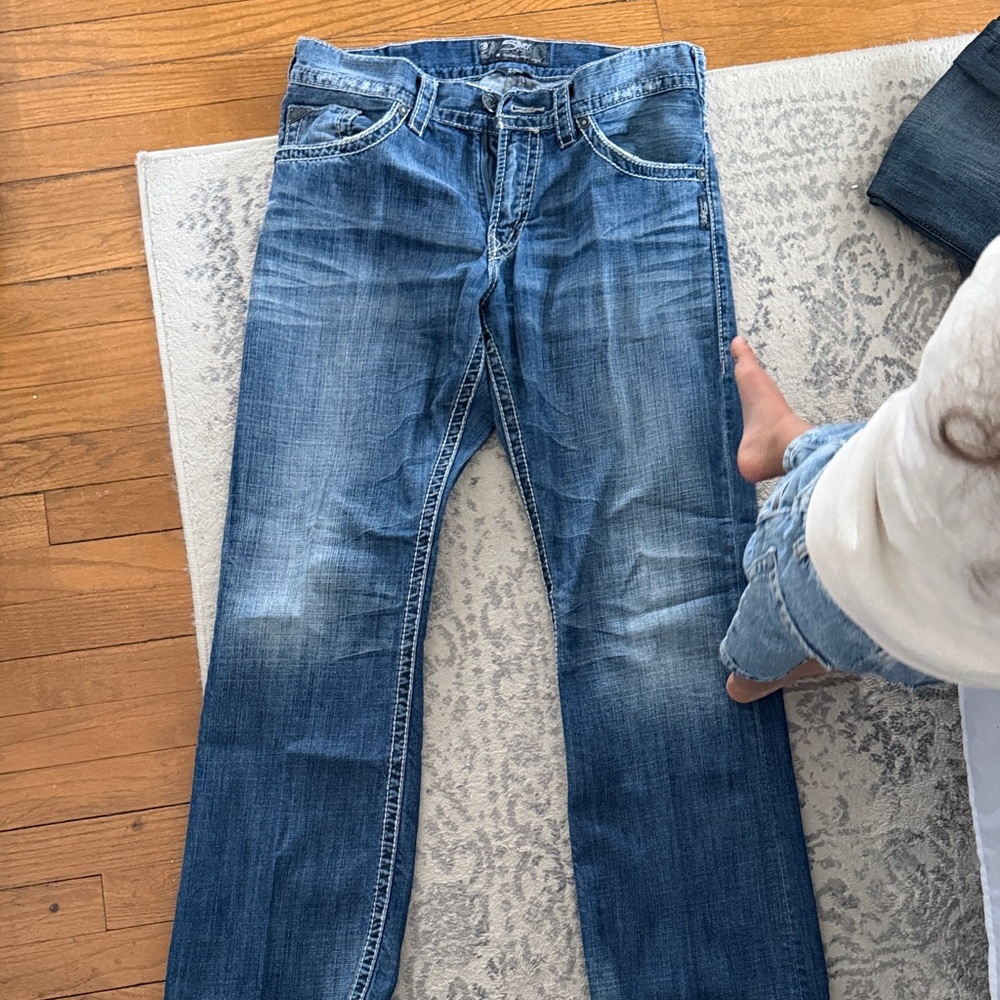 Silver men’s jeans.